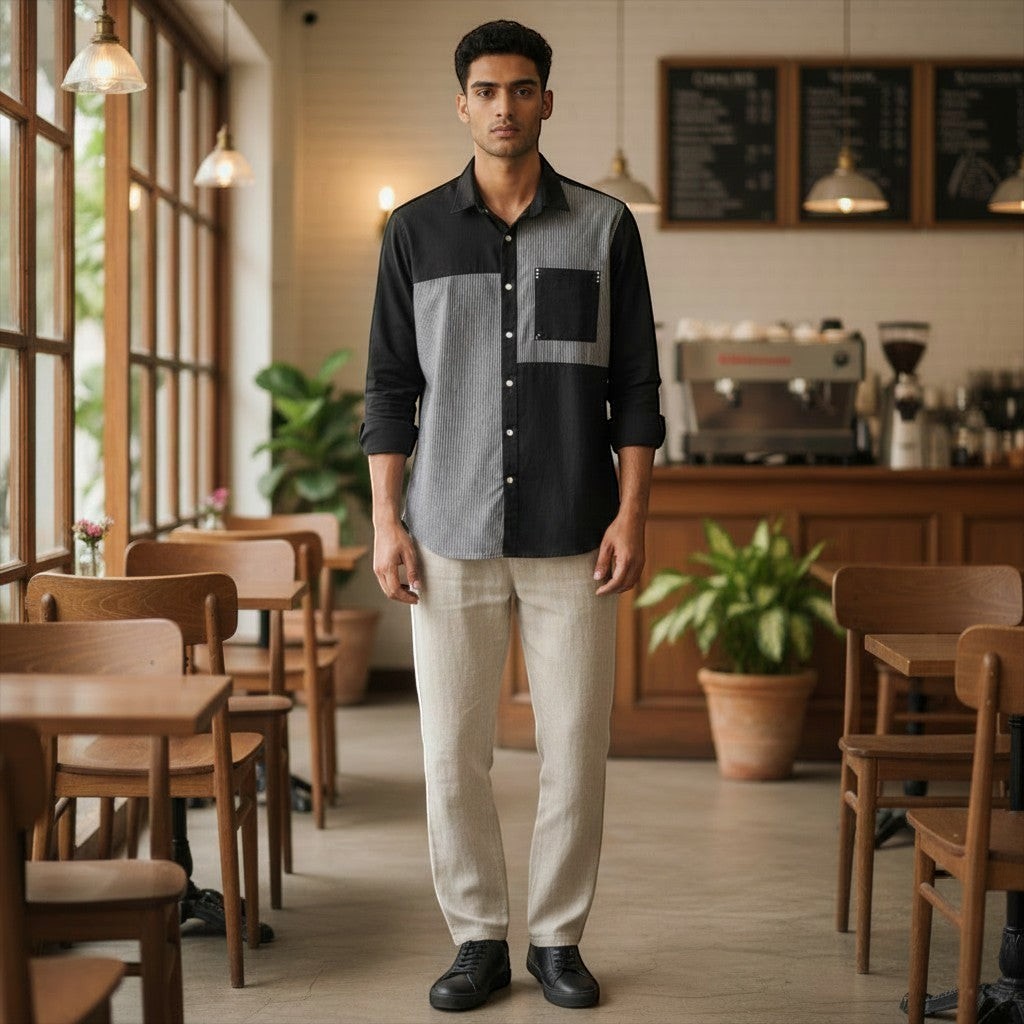 CODE92 black and grey cotton linen shirt with a soft collar and chest pocket worn by a man in a cafe setting